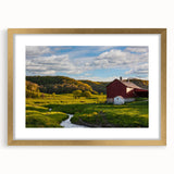Elegant gold-framed wall art featuring a serene landscape with a rustic barn, expertly matted for a refined finish, enhancing any home decor style.
