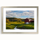 Framed wall art collection showcasing a serene landscape with a rustic barn, presented in a silver frame with a mat, perfect for enhancing home decor.