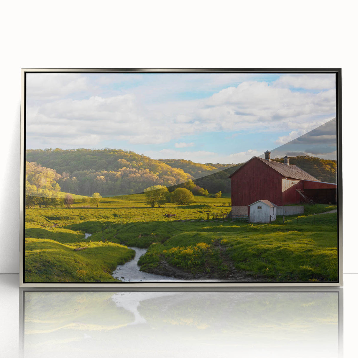 Framed acrylic wall art showcasing a picturesque landscape with a rustic barn, featuring vibrant colors and intricate details, perfect for home decor enthusiasts.