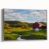 Framed wall art featuring a serene landscape with a rustic barn, set against a vibrant sunset background, showcasing rich colors and fine details for home decor.