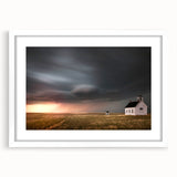 Framed wall art featuring a serene landscape with a rustic barn, showcased in a white mat and frame, perfect for enhancing home decor and creating a calming ambiance.