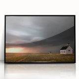 Framed acrylic wall art showcasing a stunning landscape of rustic barns, featuring a sleek black frame and vibrant colors, ideal for home decor enhancement.