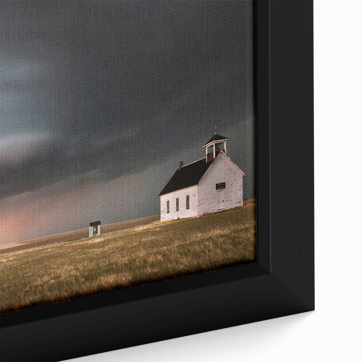 Close-up of a framed canvas wall art piece showcasing a rustic barn landscape design, featuring warm earthy tones and intricate details that enhance its charm. Ideal for home decor enthusiasts seeking nature-inspired artwork.
