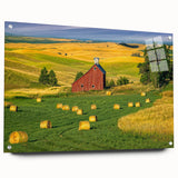 Acrylic glass wall art showcasing a serene landscape with rustic barns, set against a vibrant sunset. Features a side view display with decorative pins for easy hanging.