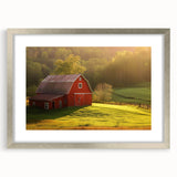 Framed wall art featuring a serene landscape of rustic barns against a vibrant sky, elegantly presented with a silver mat, perfect for home décor.