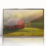 Framed wall art featuring a stunning landscape of rustic barns, highlighted with silver acrylic framing, perfect for enhancing home decor with a touch of nature.