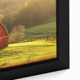 Framed canvas art piece showcasing a beautiful landscape with rustic barns, vibrant colors, and intricate details, perfect for enhancing home decor and adding warmth.