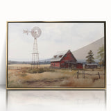 Framed acrylic wall art featuring a picturesque landscape with a rustic barn, set against a vibrant sunset sky with warm golden hues, perfect for home decor.