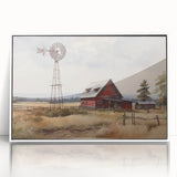Framed acrylic wall art featuring a scenic landscape of a rustic barn, highlighted by a white frame, perfect for enhancing home decor and adding a touch of countryside charm.