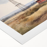 Rolled canvas showcasing a serene landscape with rustic barns under a vibrant sunset, ideal for home decor and wall art enthusiasts, beautifully packaged for delivery.
