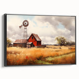 Framed canvas wall art showcasing a rustic landscape with a charming red barn under a blue sky, perfect for enhancing home decor with a touch of countryside charm.