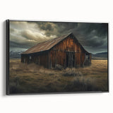 Framed canvas wall art depicting a serene landscape with barn structures, featuring a black frame and side view, perfect for home decor and rustic themes.