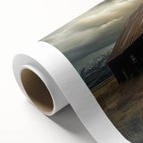 Rolled canvas artwork showcasing a serene landscape with a rustic barn under a vibrant sunset, designed for home decor, highlighting warm colors and natural beauty.