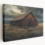Stretched canvas wall art featuring a picturesque landscape of rustic barns under a vibrant sunset, showcasing warm hues of orange and gold with detailed textures.