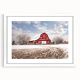 Framed landscape wall art showcasing a rustic barn scene with vibrant colors, featuring a white mat and sleek frame, ideal for home decor enhancement.