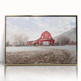 Framed acrylic wall art showcasing a picturesque landscape with rustic barns, set against a golden backdrop, perfect for enhancing home decor.