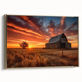 Framed canvas wall art showcasing a serene landscape with rustic barns, set against a vibrant sunset. The piece features a gold frame, adding elegance and warmth to home decor. Ideal for enhancing living spaces with a touch of rural charm and artistic flair.