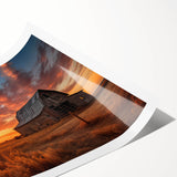 Rustic landscape barn wall art print showcasing a serene countryside scene with a weathered barn, lush greenery, and a vibrant blue sky, rolled for easy display.