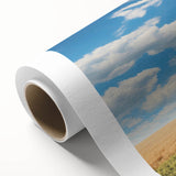 Rustic landscape wall art featuring a serene barn scene with rolling hills, vibrant greenery, and a clear blue sky, printed on high-quality rolled canvas for easy framing.