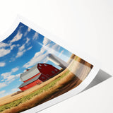 Rustic barn landscape wall art print showcasing vibrant colors and intricate details, rolled for easy display and shipping in a protective tube. Perfect for farmhouse decor enthusiasts.