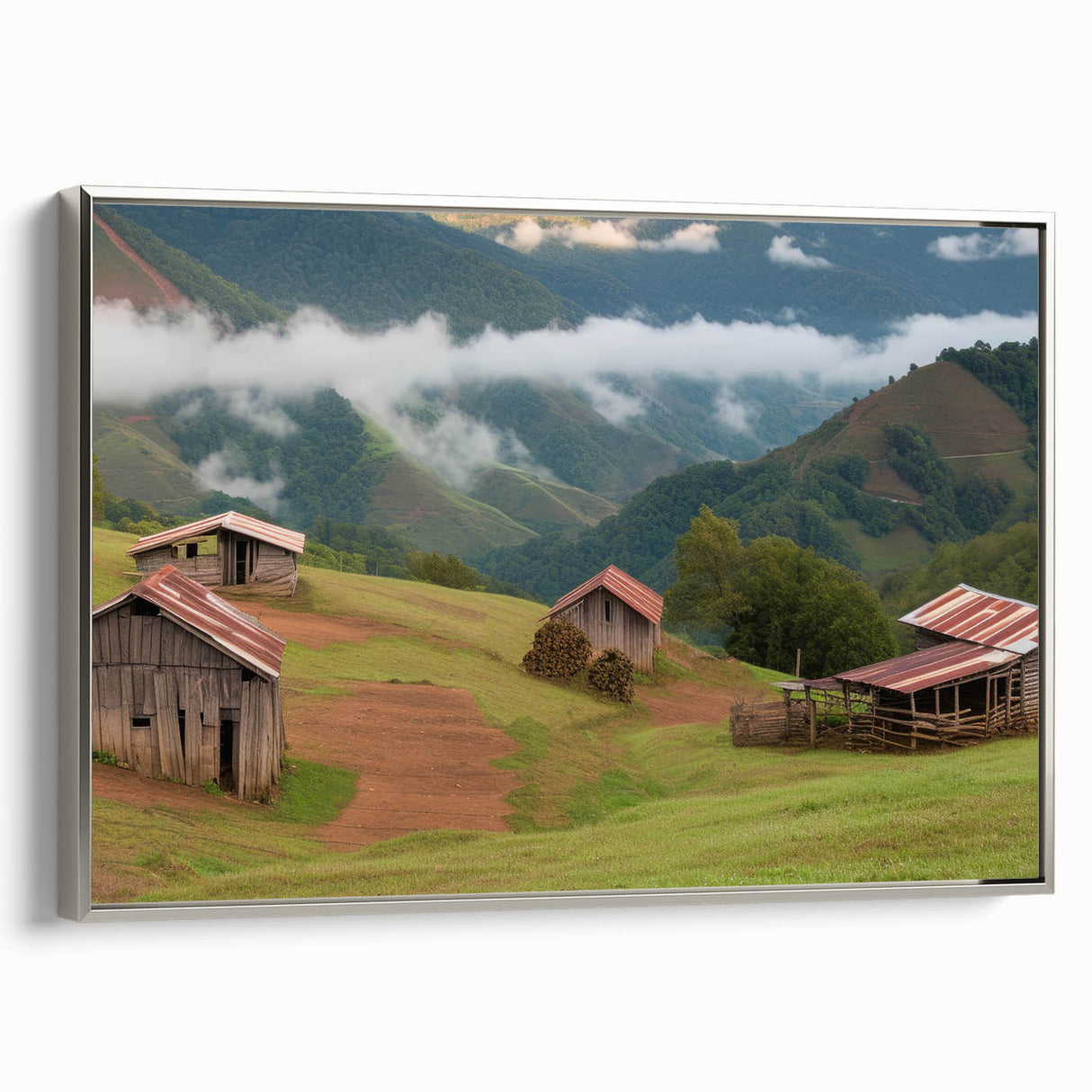 Framed canvas wall art showcasing a serene landscape with a rustic red barn surrounded by lush green fields, enhancing home decor with a touch of tranquility.