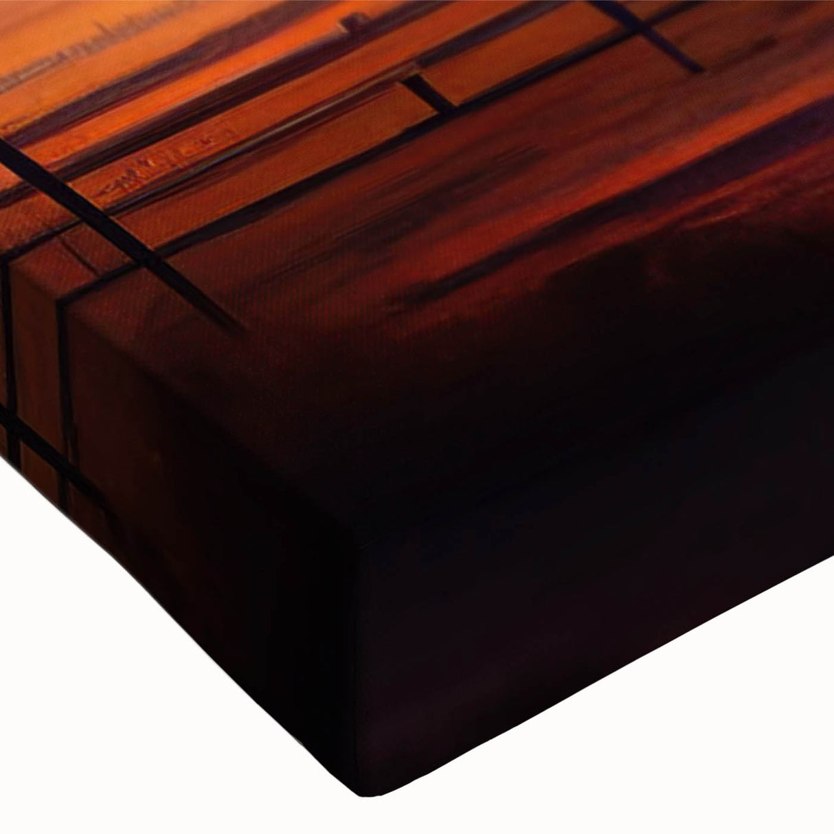 Close-up of a stretched canvas featuring a vibrant landscape design with rustic barns, showcasing rich colors and intricate details, perfect for home decor.