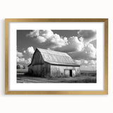 Framed wall art collection showcasing a scenic landscape with rustic barns, featuring a gold mat and frame, perfect for enhancing home decor aesthetics.
