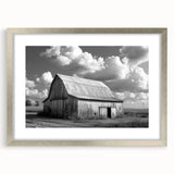 Framed wall art collection showcasing a serene landscape of a rustic barn, highlighted with a silver mat and frame, perfect for enhancing home decor.