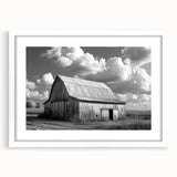 Framed wall art collection showcasing a serene barn landscape design in a white mat, perfect for enhancing home decor with rustic charm. The artwork features soft colors that evoke tranquility and warmth, ideal for country-themed interiors.