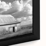 Framed canvas wall art showcasing a close-up of a rustic barn landscape, featuring warm earth tones and intricate details, perfect for home decor enthusiasts.