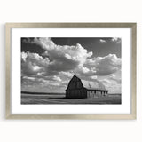 Framed silver wall art featuring a rustic barn landscape design, elegantly matted for a sophisticated touch, perfect for enhancing home decor.