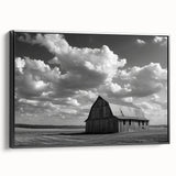 Framed canvas wall art showcasing a serene landscape with rustic barns, set against a vibrant sunset, ideal for farmhouse decor and nature enthusiasts.