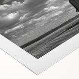 Rustic landscape featuring a serene barn scene at sunset, printed on rolled canvas, showcasing warm orange and yellow hues, ideal for cozy home decor.