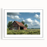 Framed landscape wall art collection featuring rustic barns, set in a white mat frame. Ideal for home decor, enhancing any living space with a serene rural aesthetic.