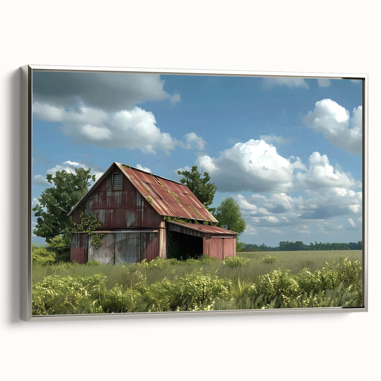 Framed canvas wall art featuring a serene landscape of a rustic barn surrounded by green fields and trees, showcasing a silver frame that enhances its elegance.