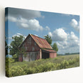 Stretched canvas wall art showcasing a picturesque landscape of red barns amidst lush green fields, perfect for adding rustic charm to home decor.