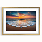 Framed landscape wall art featuring a serene beach scene, accented with a gold mat, perfect for home decor. Ideal for adding elegance to any space.