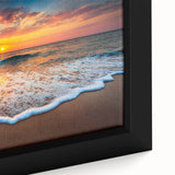 Framed canvas artwork of a serene beach landscape, showcasing vibrant colors and detailed textures, perfect for home decor and coastal aesthetics.