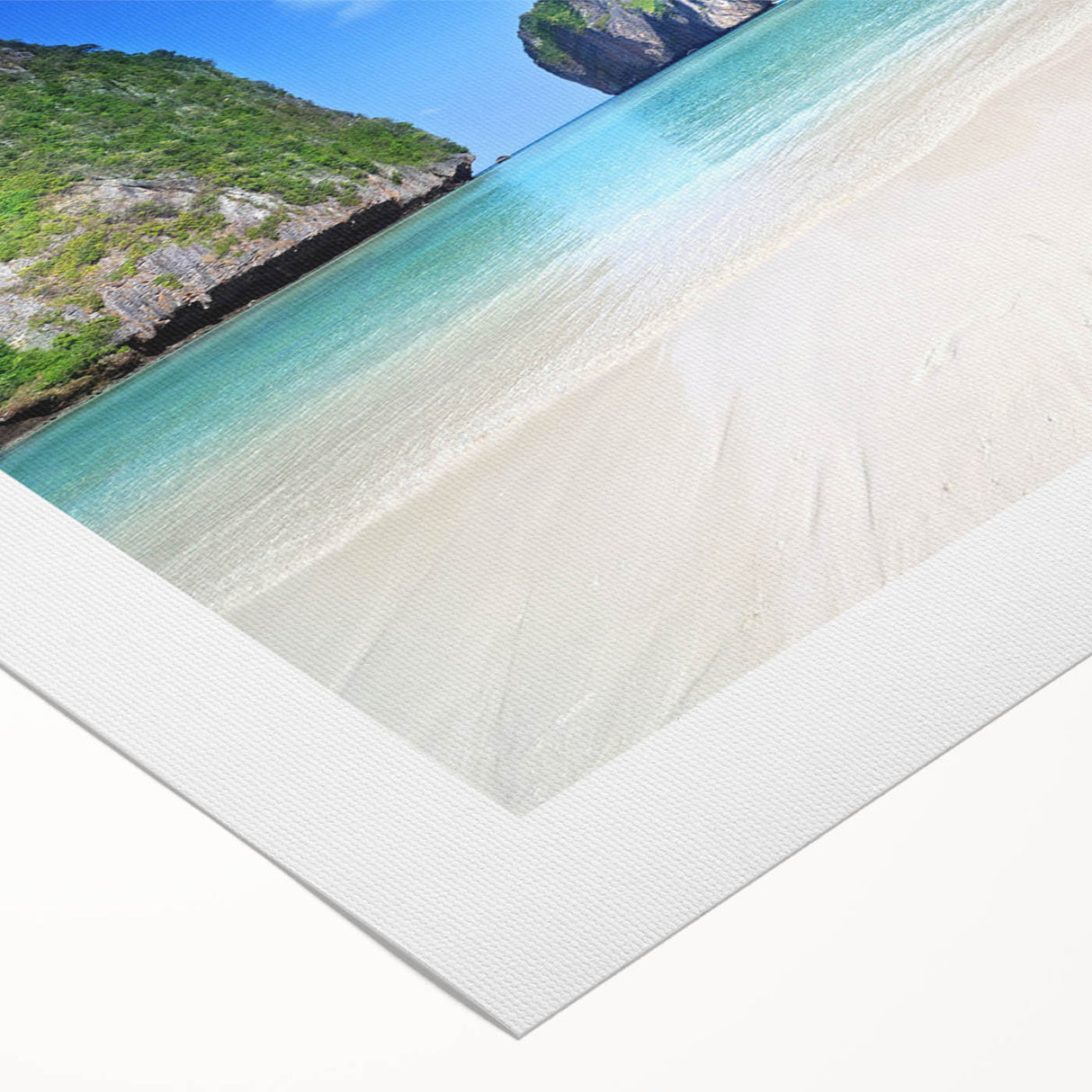 Vibrant rolled canvas showcasing a serene beach landscape with golden sands and turquoise waters, perfect for enhancing coastal-themed decor in living spaces.