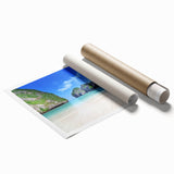 Vibrant rolled print of a serene beach landscape, showcasing turquoise waters and soft sandy shores, ideal for home decor enhancement. Perfect for coastal-themed interiors.