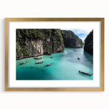 Framed wall art collection showcasing a serene beach landscape with vibrant colors, featuring a gold mat and elegant frame, perfect for home decor.
