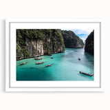 Framed wall art featuring a serene beach landscape design with vibrant colors, set in a white mat, perfect for adding a calming touch to home decor.