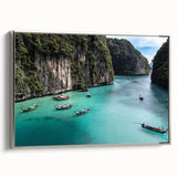 Framed canvas wall art depicting a serene beach landscape with vibrant colors and soft waves, showcased from a side view with a sleek silver frame.