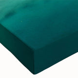 Close-up of a stretched canvas wall art piece showcasing a serene beach landscape with vibrant blues and sandy tones, perfect for coastal decor enthusiasts.