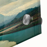 Close-up of a vibrant acrylic glass artwork depicting a serene beach landscape, showcasing soft waves and a colorful sunset, perfect for modern home decor.