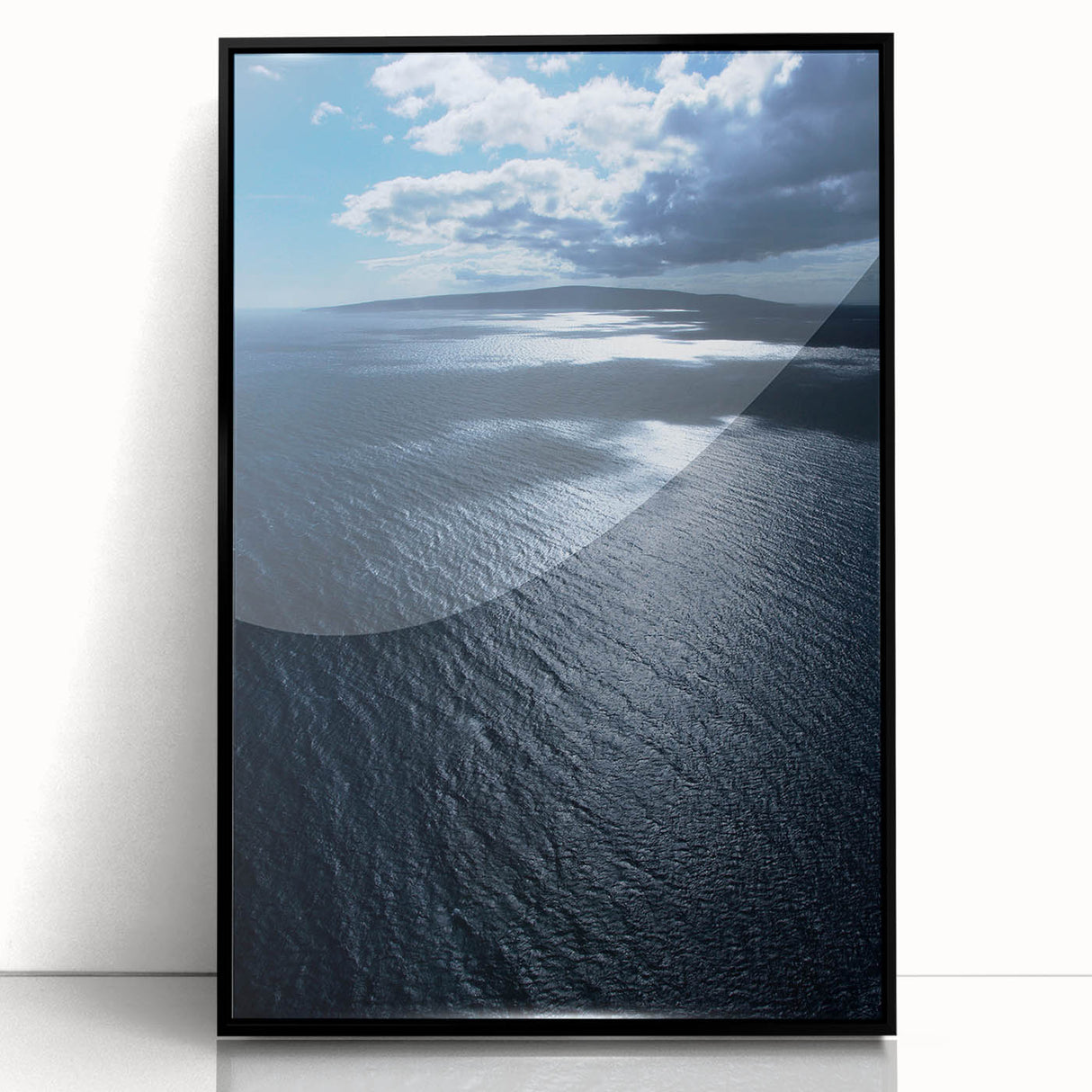 Framed wall art collection showcasing a serene beach landscape with vibrant colors, set in a sleek black frame, perfect for coastal-themed decor.