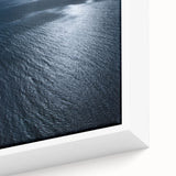 Framed canvas artwork showcasing a serene beach landscape with vibrant colors and detailed textures, perfect for enhancing home decor and creating a calming atmosphere.