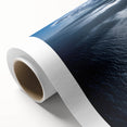 Vibrant rolled canvas art showcasing a serene beach landscape with soft blue skies and gentle waves, ideal for home decor. Packaged securely in a protective tube.