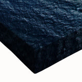 Close-up view of a vibrant stretched canvas wall art piece showcasing a serene beach landscape with soft pastel colors, perfect for home decor and relaxation.