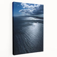 Stretched canvas wall art showcasing a serene beach landscape with vibrant colors and intricate details, perfect for home decor and coastal themes.